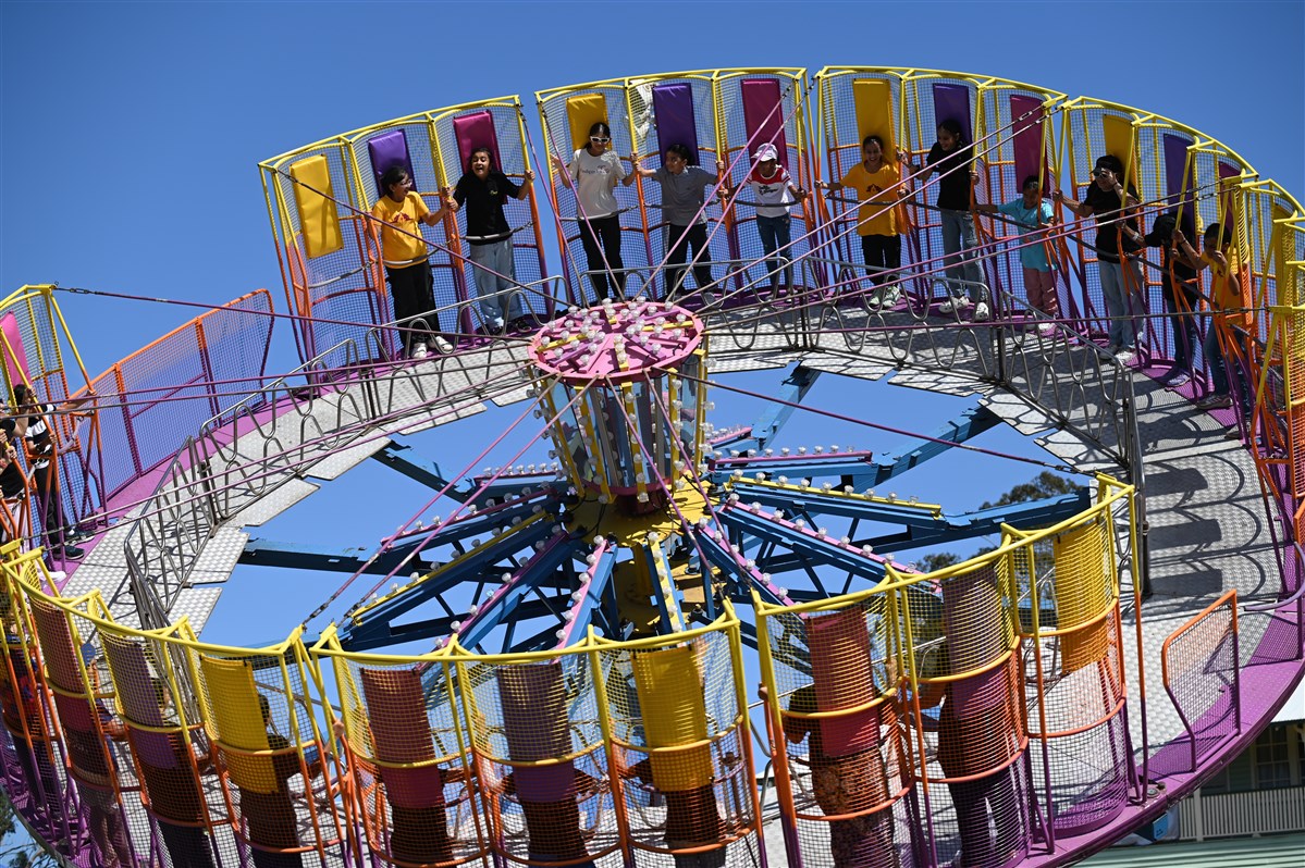 Children enjoying a carnival ride